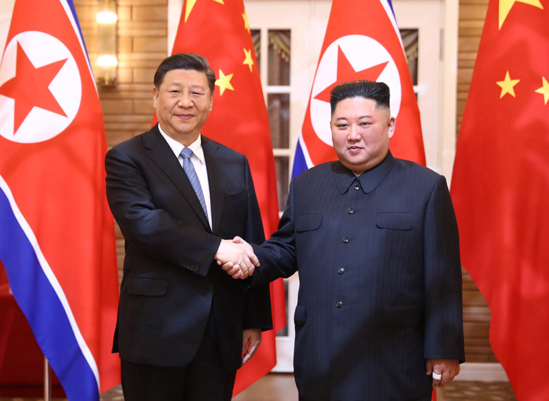 习近平同朝鲜劳动党委员长、国务委员会委员长金正恩举行会谈